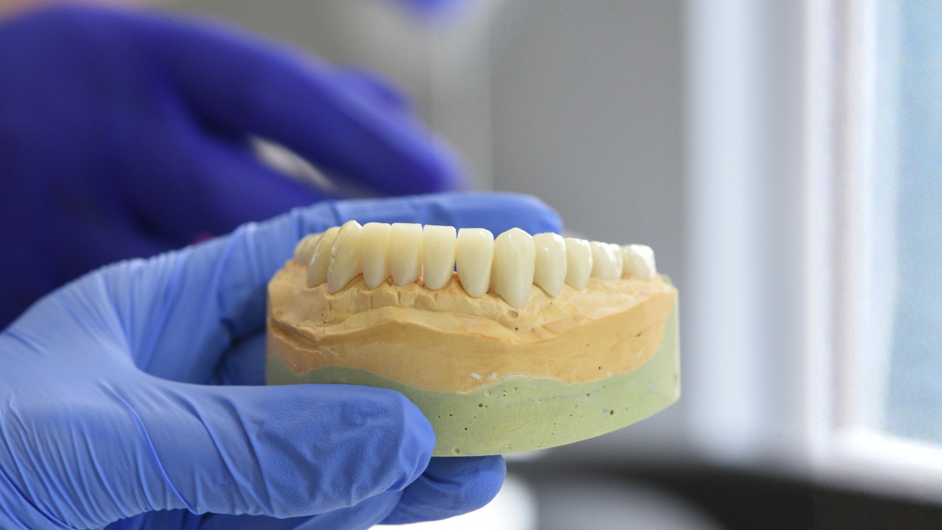 holding a denture