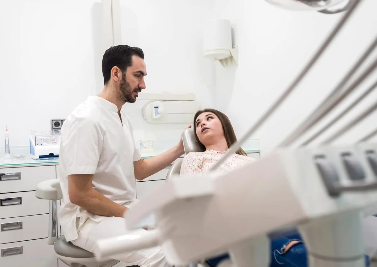 Patient discussing what to expect with sedation dentistry before undergoing a dental procedure.
